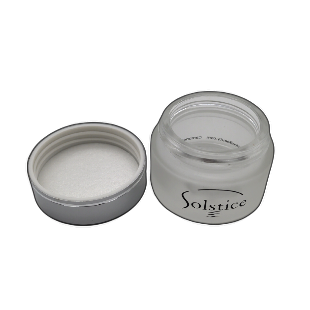 Frosted glass jar with silver cap — detail